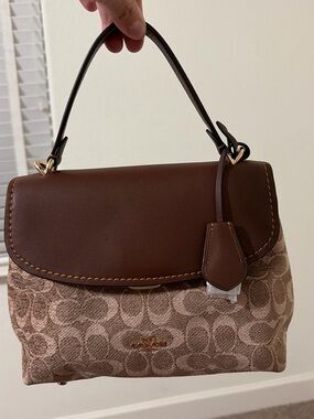 NWT Coach Emory Top Handle Bag
In Signature Chenille